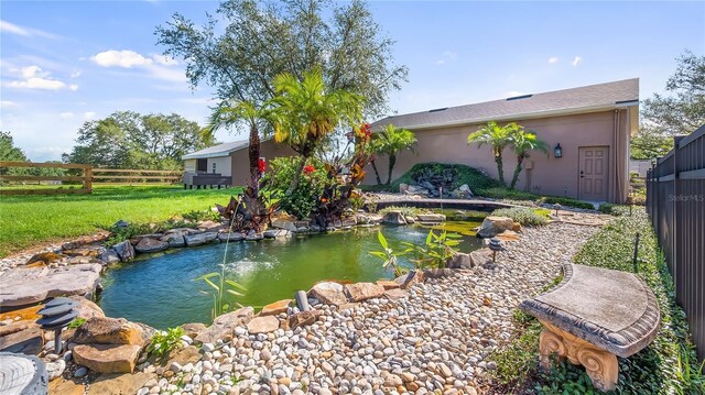 15245 Arabian Way, Montverde, FL 34756 - view of yard with a garden pond