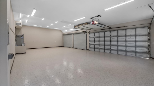 15245 Arabian Way, Montverde, FL 34756 - garage featuring a garage door opener