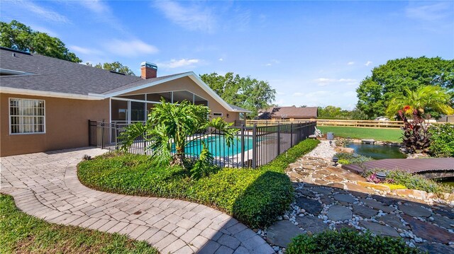 15245 Arabian Way, Montverde, FL 34756 - view of pool with fence and a patio