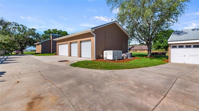 15245 Arabian Way, Montverde, FL 34756 - detached garage featuring central AC