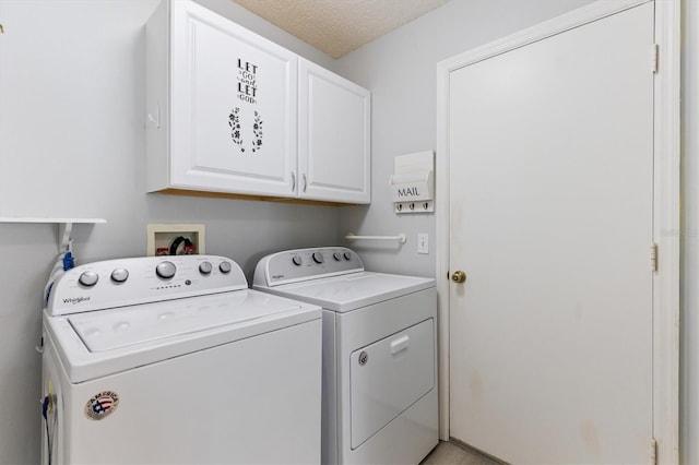 1615 Navidad St, The Villages, FL 32162 - washroom featuring washing machine and clothes dryer, cabinet space, and a textured ceiling