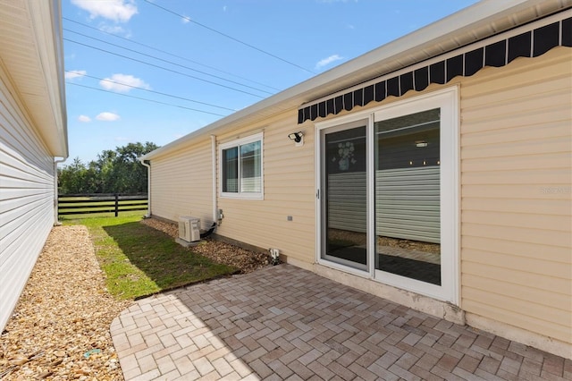 1615 Navidad St, The Villages, FL 32162 - view of patio / terrace with central AC