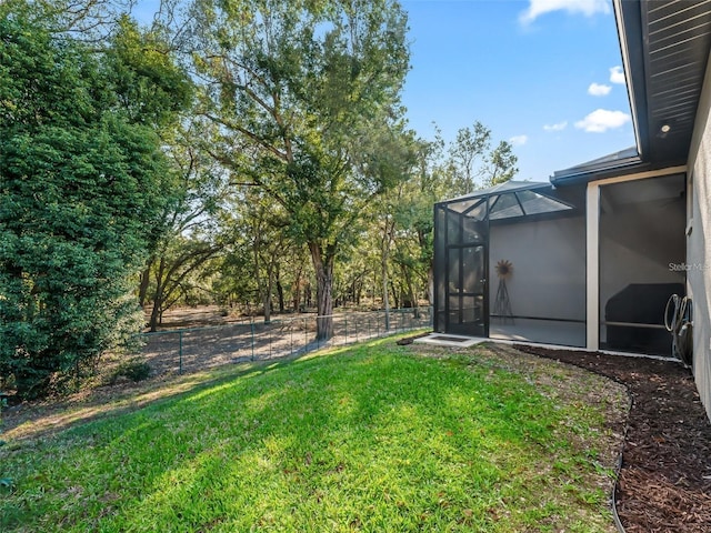 10994 SE 168th Loop, Summerfield, FL 34491 - view of yard featuring glass enclosure
