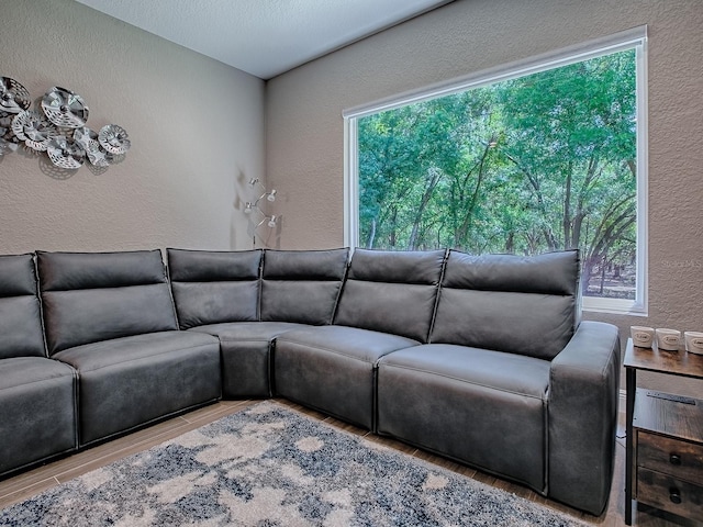 10994 SE 168th Loop, Summerfield, FL 34491 - living area featuring a textured wall and wood finished floors