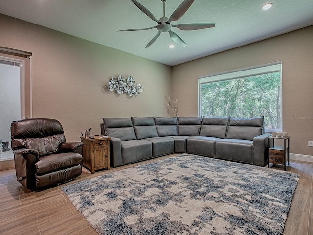10994 SE 168th Loop, Summerfield, FL 34491 - living room featuring a ceiling fan, wood finished floors, recessed lighting, and baseboards
