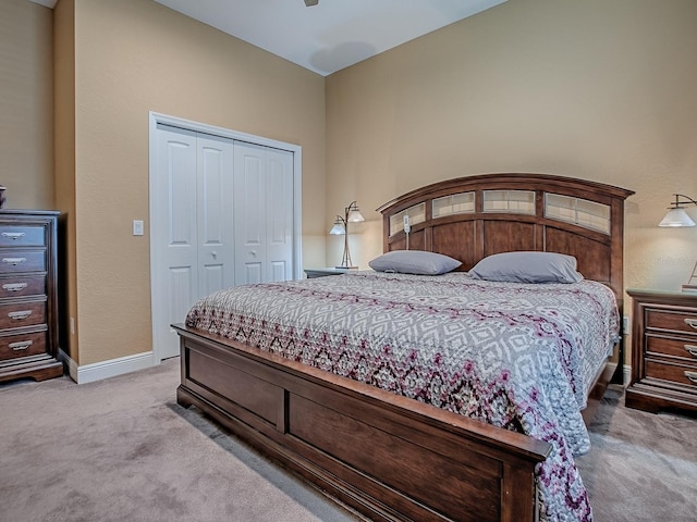 10994 SE 168th Loop, Summerfield, FL 34491 - carpeted bedroom featuring a closet, baseboards, and ceiling fan