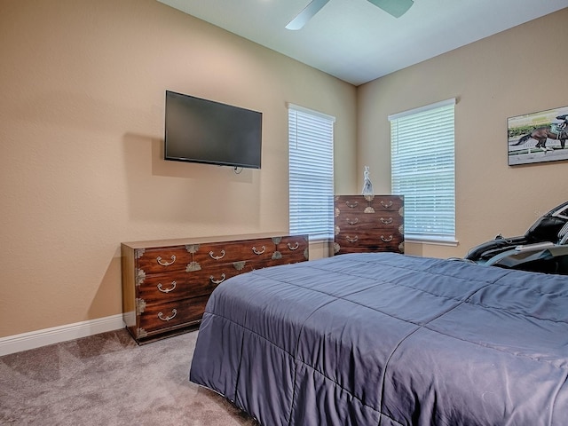 10994 SE 168th Loop, Summerfield, FL 34491 - carpeted bedroom with baseboards and a ceiling fan