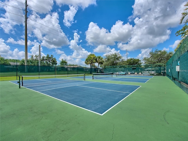 10994 SE 168th Loop, Summerfield, FL 34491 - view of tennis court with fence and community basketball court