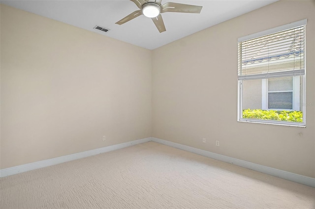 926 Wood Briar Loop, Sanford, FL 32771 - spare room featuring healthy amount of natural light, a ceiling fan, baseboards, and light carpet