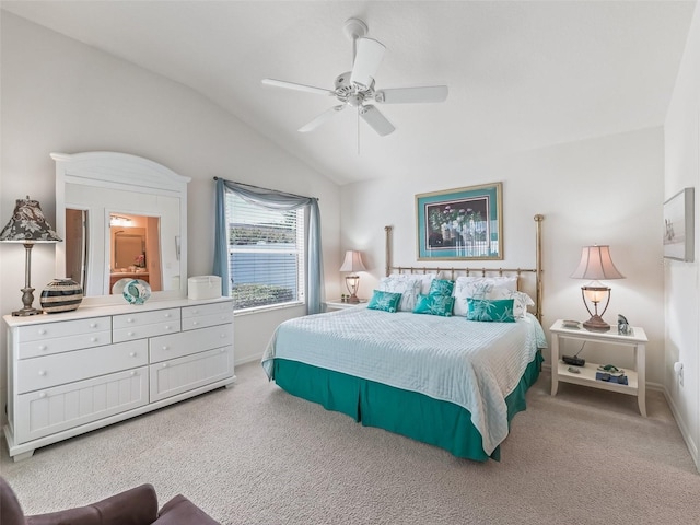1713 Jadestone Ter, The Villages, FL 32162 - bedroom with lofted ceiling, light colored carpet, a ceiling fan, and baseboards