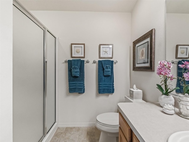 1713 Jadestone Ter, The Villages, FL 32162 - full bath featuring a shower stall, vanity, toilet, and baseboards