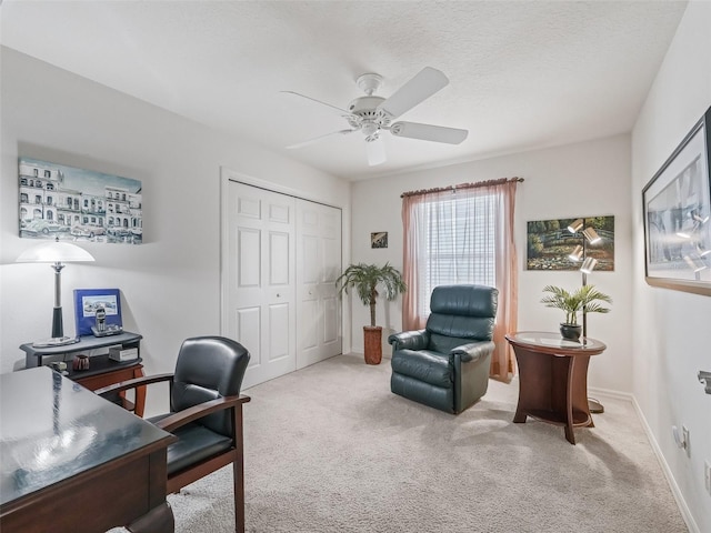 1713 Jadestone Ter, The Villages, FL 32162 - home office featuring carpet, a ceiling fan, baseboards, and a textured ceiling