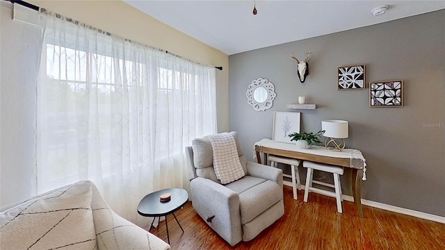 sitting room featuring wood finished floors and baseboards