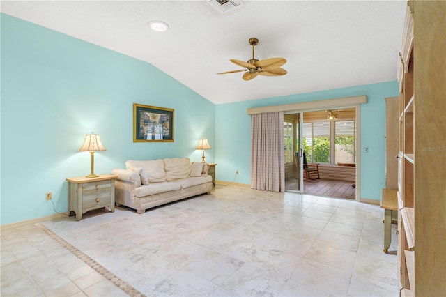 735 Palma Dr, The Villages, FL 32159 - living area featuring vaulted ceiling, ceiling fan, and baseboards