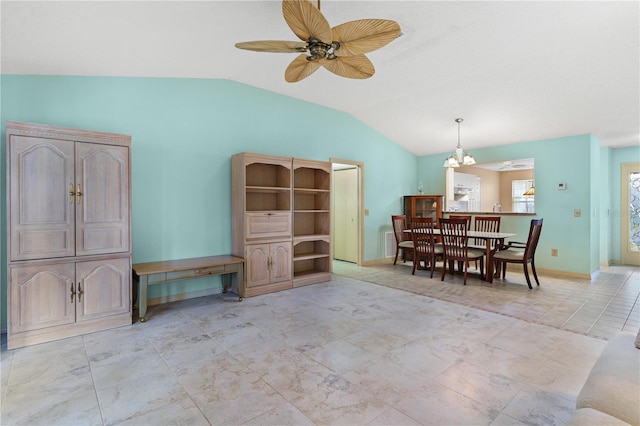 735 Palma Dr, The Villages, FL 32159 - dining room with vaulted ceiling, ceiling fan, and baseboards