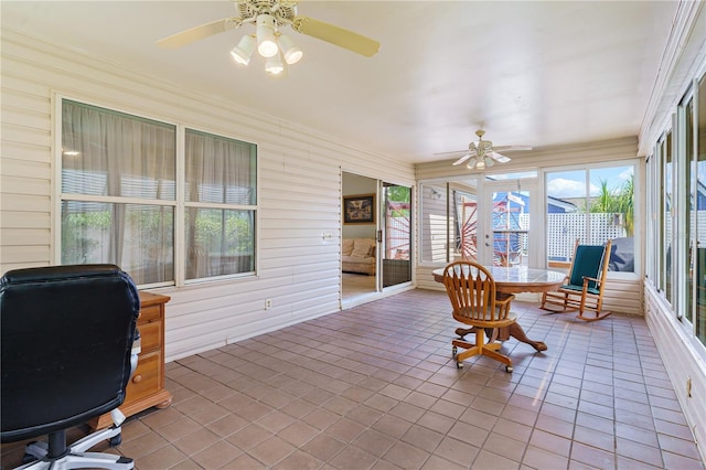 735 Palma Dr, The Villages, FL 32159 - sunroom / solarium with tile patterned flooring and wooden walls