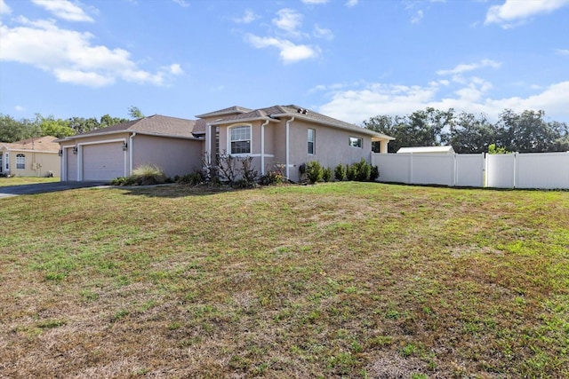 915 N Fox Meadow Ter, Crystal River, FL 34429 - ranch-style home with driveway, an attached garage, and stucco siding
