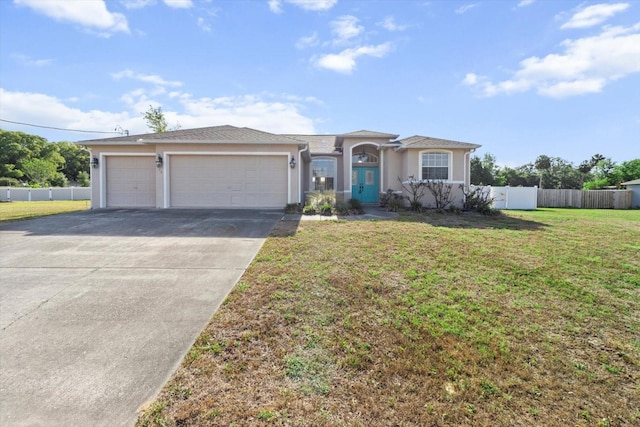 915 N Fox Meadow Ter, Crystal River, FL 34429 - ranch-style home with an attached garage, driveway, and stucco siding