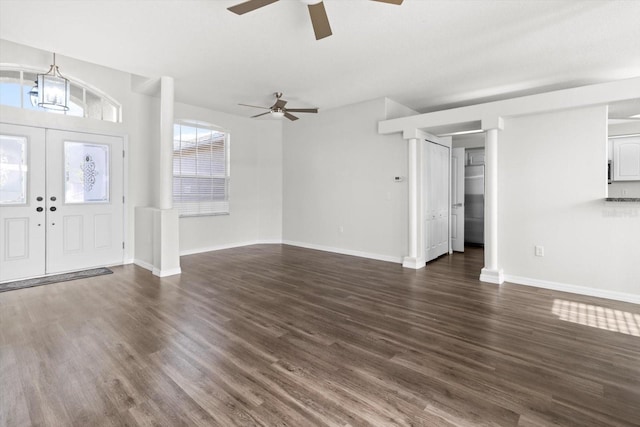 915 N Fox Meadow Ter, Crystal River, FL 34429 - foyer entrance featuring a ceiling fan, dark wood finished floors, baseboards, french doors, and a chandelier