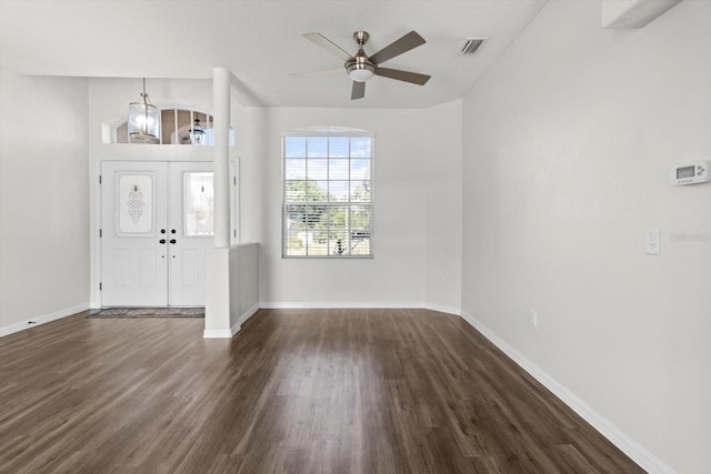 915 N Fox Meadow Ter, Crystal River, FL 34429 - entryway featuring dark wood-style flooring, ceiling fan, baseboards, and a chandelier