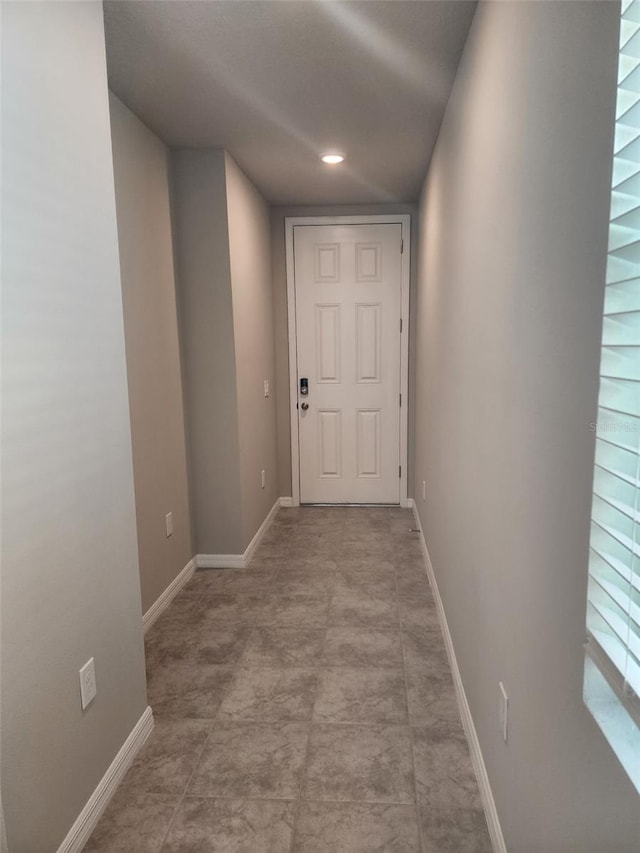1808 Carnostie Rd, Winter Haven, FL 33884 - hall with baseboards and recessed lighting
