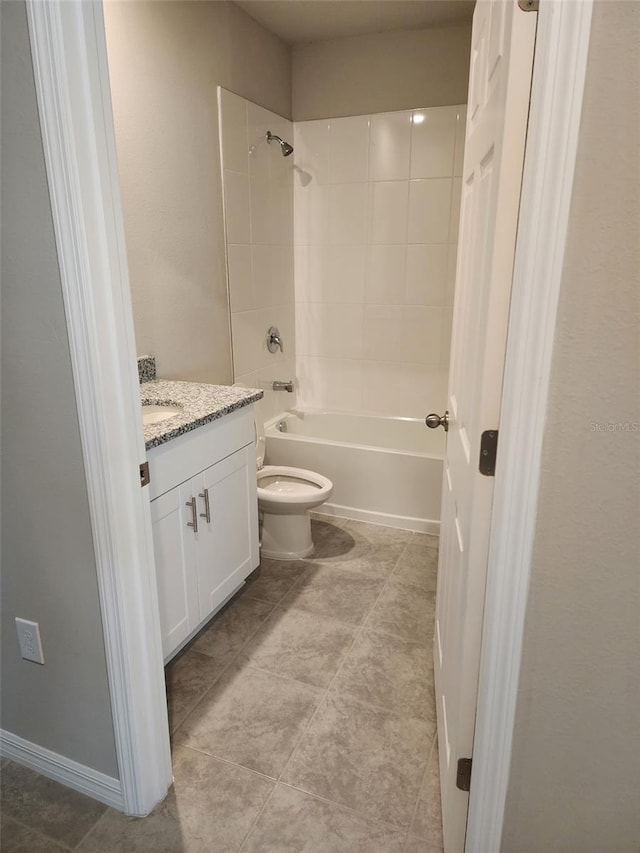 1808 Carnostie Rd, Winter Haven, FL 33884 - full bath featuring vanity, shower / washtub combination, toilet, and tile patterned floors