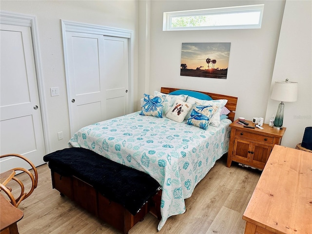 12077 Lakeshore Way, Oxford, FL 34484 - bedroom featuring light wood-type flooring and a closet