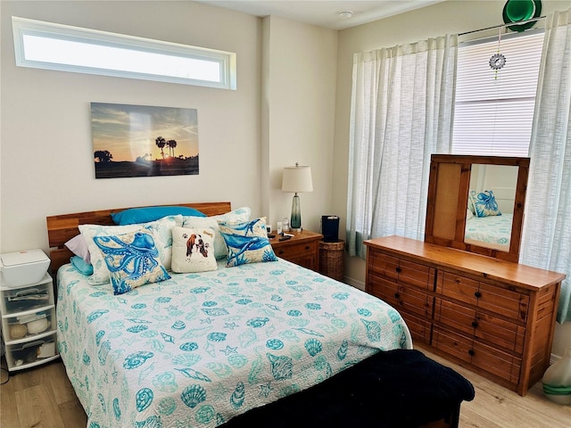 12077 Lakeshore Way, Oxford, FL 34484 - bedroom with wood finished floors