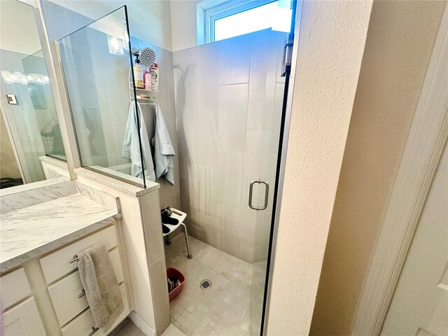 12077 Lakeshore Way, Oxford, FL 34484 - bathroom with a shower stall and vanity