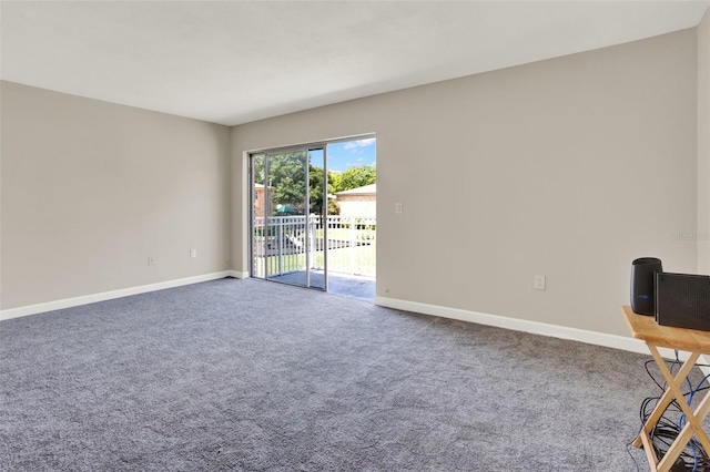 2423 Branch Way Unit 207, Maitland, FL 32751 - unfurnished room featuring baseboards, carpet floors, and an office area