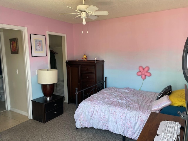 206 Orchid Dr, Davenport, FL 33897 - carpeted bedroom with a closet and ceiling fan