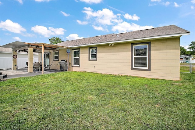 1204 Monterey Dr, Eustis, FL 32726 - rear view of house with a patio and a shingled roof