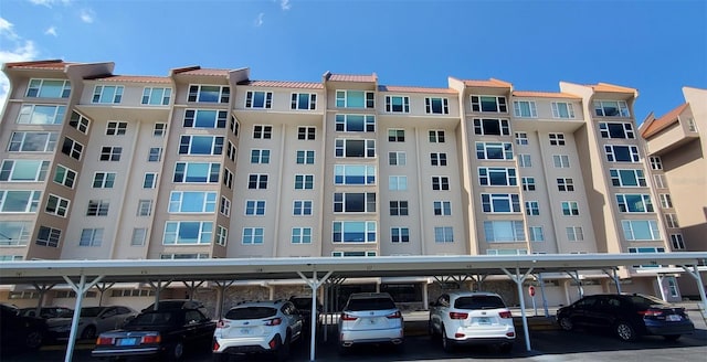 632 Edgewater Dr Unit 832, Dunedin, FL 34698 - view of apartment building / complex with covered parking