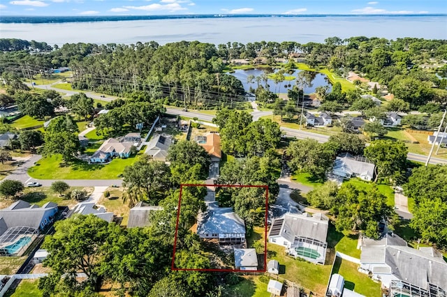 2711 Bayview Dr, Eustis, FL 32726 - aerial perspective of suburban area with a nearby body of water and property boundaries highlighted