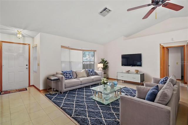 501 Cherry Tree St, Eustis, FL 32726 - tiled living room with vaulted ceiling, a ceiling fan, and baseboards