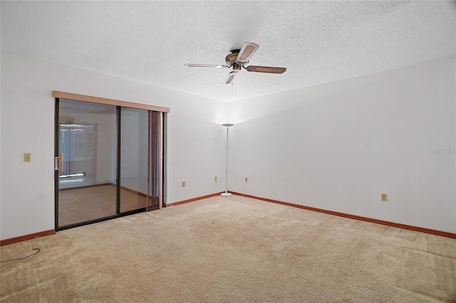 501 Cherry Tree St, Eustis, FL 32726 - empty room featuring a ceiling fan, carpet, baseboards, and a textured ceiling