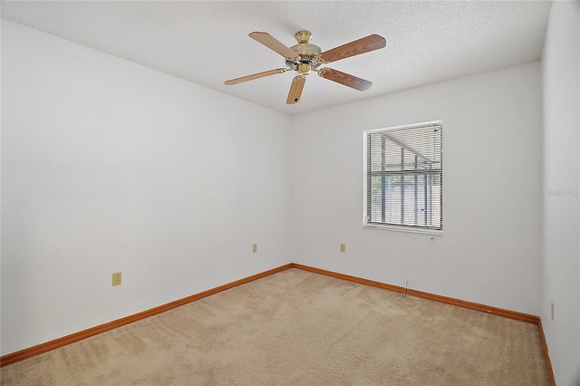 501 Cherry Tree St, Eustis, FL 32726 - empty room with light colored carpet, baseboards, and a ceiling fan