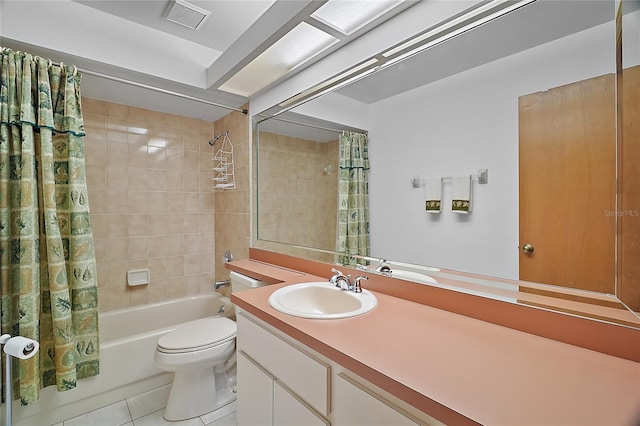 501 Cherry Tree St, Eustis, FL 32726 - bathroom featuring shower / bath combination with curtain, tile patterned floors, vanity, and toilet