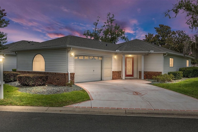 8608 SE 141st Street Rd, Summerfield, FL 34491 - single story home featuring brick siding, an attached garage, and driveway