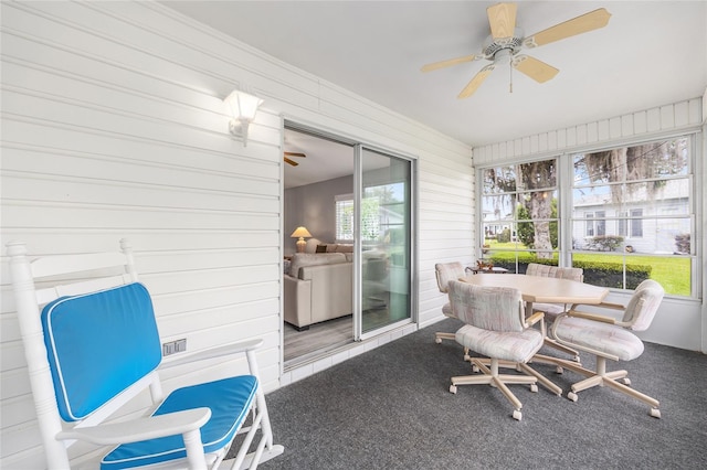 8608 SE 141st Street Rd, Summerfield, FL 34491 - sunroom / solarium with a ceiling fan and outdoor dining area