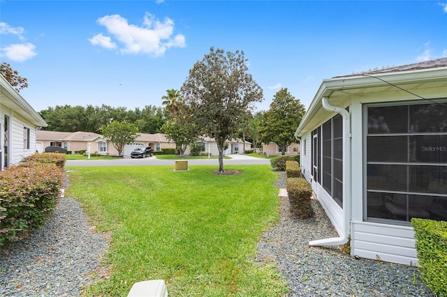 8608 SE 141st Street Rd, Summerfield, FL 34491 - view of green lawn with a residential view