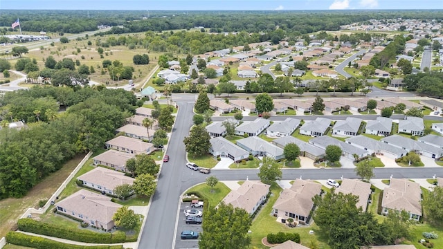 8608 SE 141st Street Rd, Summerfield, FL 34491 - aerial overview of property's location with nearby suburban area