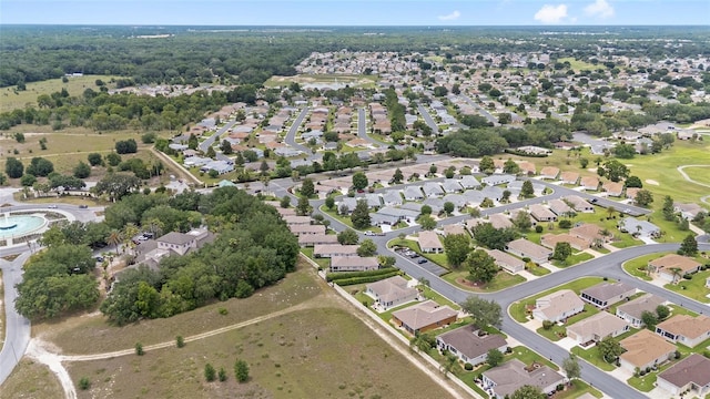 8608 SE 141st Street Rd, Summerfield, FL 34491 - aerial view of property and surrounding area with nearby suburban area