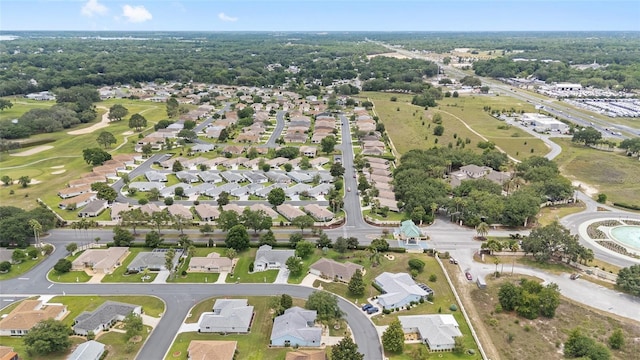 8608 SE 141st Street Rd, Summerfield, FL 34491 - aerial overview of property's location with nearby suburban area and a golf club