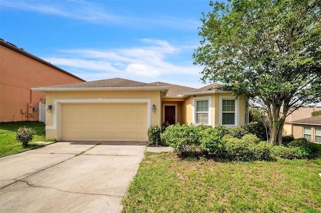 236 Savannah Preserve Loop, Davenport, FL 33837 - view of front of home with stucco siding, a garage, concrete driveway, and a front lawn