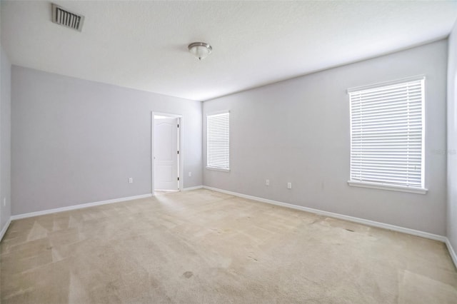 236 Savannah Preserve Loop, Davenport, FL 33837 - unfurnished room featuring light carpet and baseboards