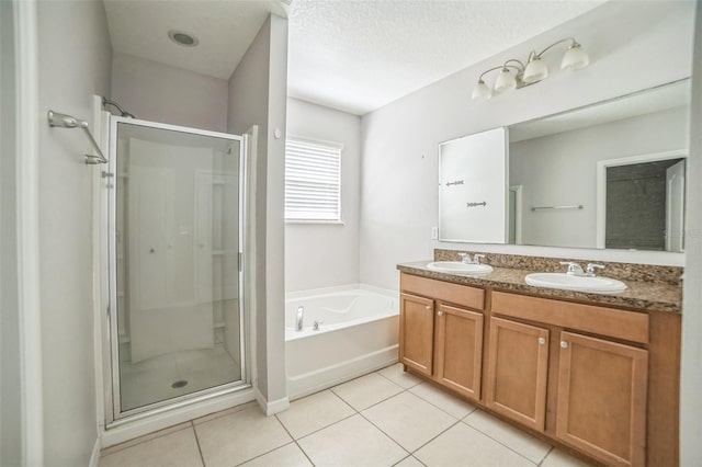 236 Savannah Preserve Loop, Davenport, FL 33837 - bathroom with a stall shower, tile patterned floors, and double vanity
