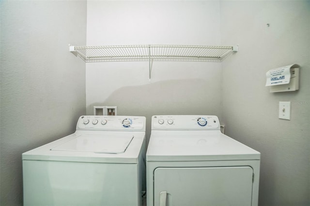 236 Savannah Preserve Loop, Davenport, FL 33837 - laundry room featuring independent washer and dryer
