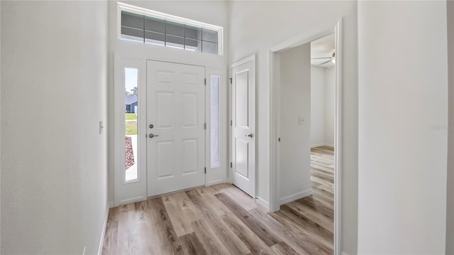 41346 Persimmon St, Eustis, FL 32736 - foyer featuring light wood-style floors and baseboards