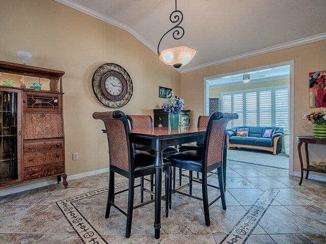 1206 Thompson Ave, The Villages, FL 32162 - dining room featuring ornamental molding, lofted ceiling, baseboards, and stone tile floors